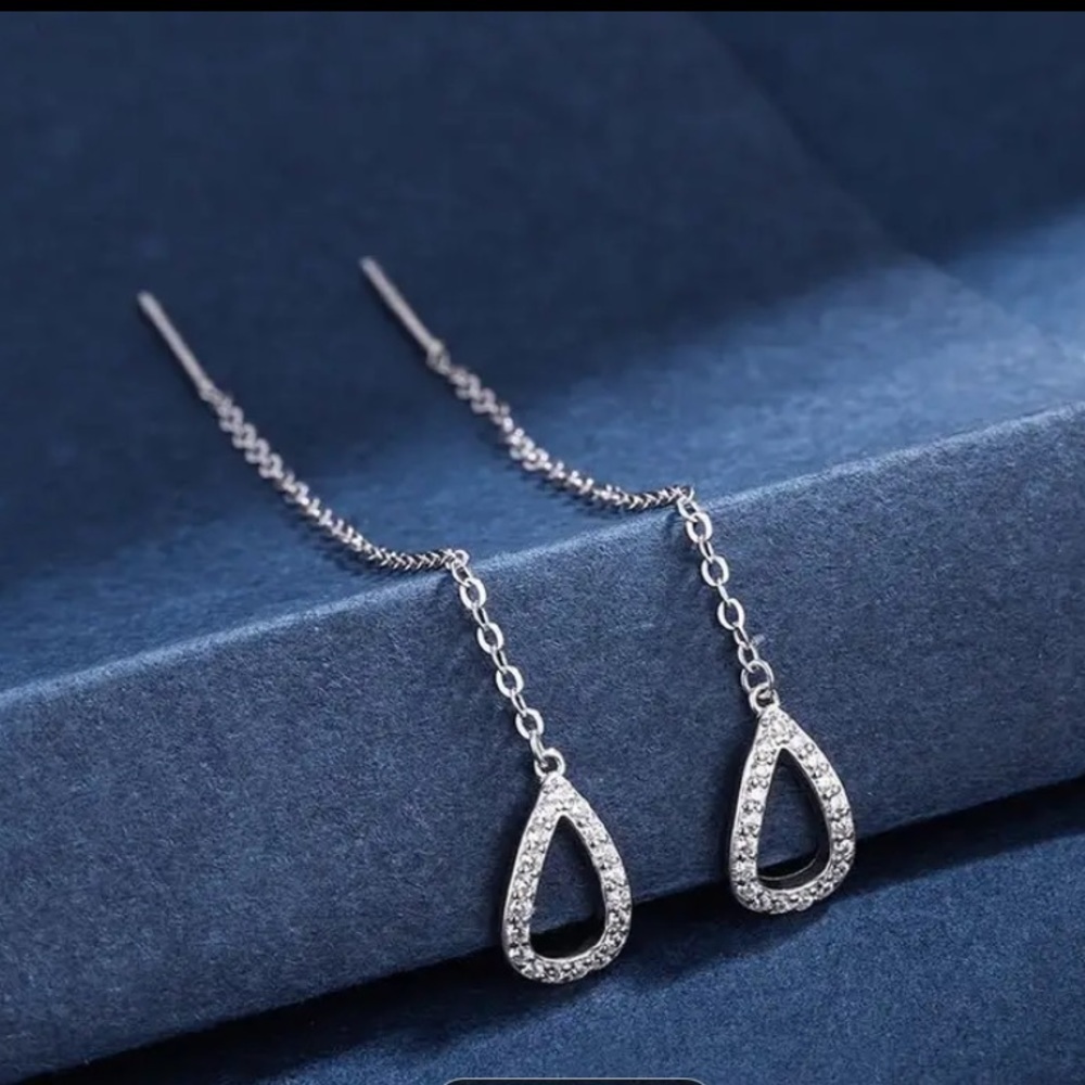 Silver tone dangle earrings
